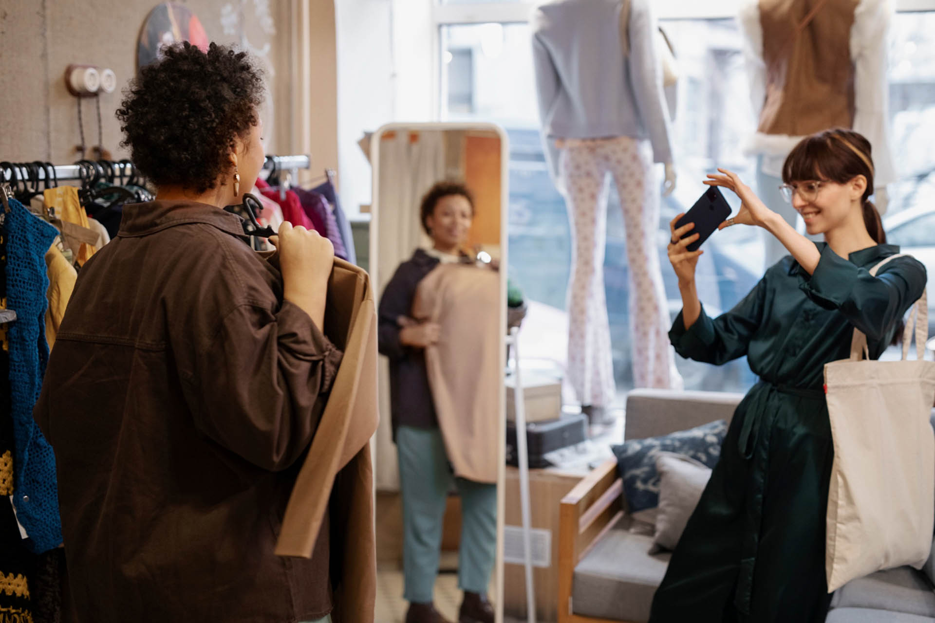 friends shopping in small boutique